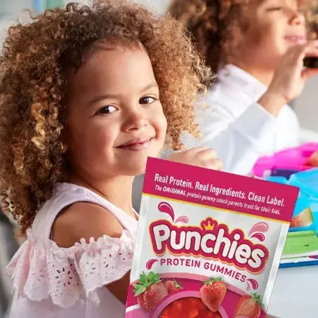 Gummy bear protein gummies: a smiling girl with a bag of Punchies protein gummies