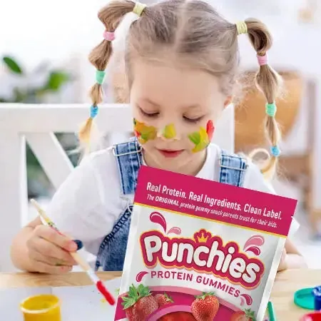 Gummy bear protein gummies: a girl painting with a bag of Punchies protein gummies